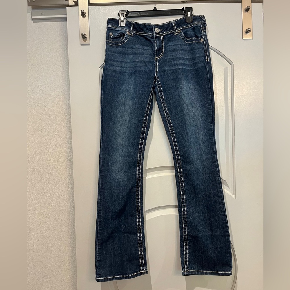 Sold Maurices medium Blue Boot Cut Jeans with contrasting stitching.